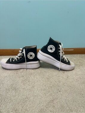 Converse women’s Black and White High-Top Platform Sneakers
